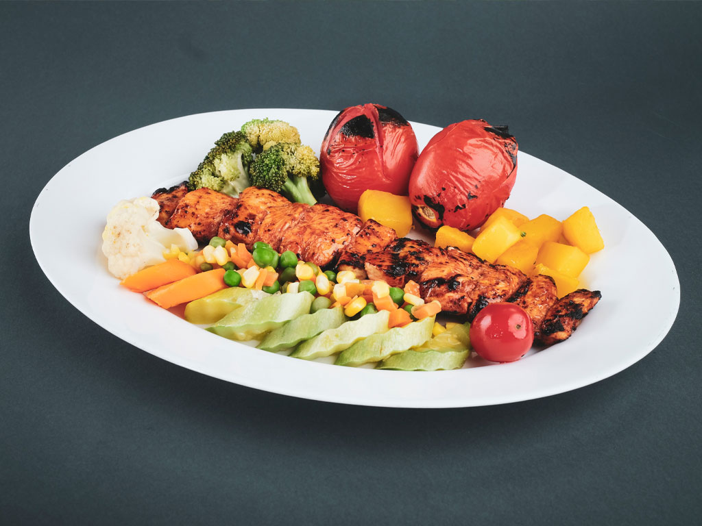 plate of vegetables and salmon